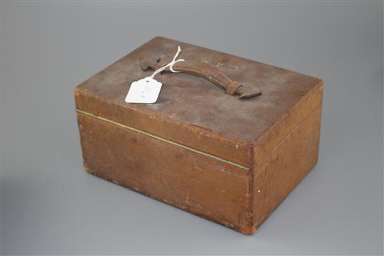 An Asprey of London leather jewellery box, with two interior trays and carrying handle, width, 25.4cm.